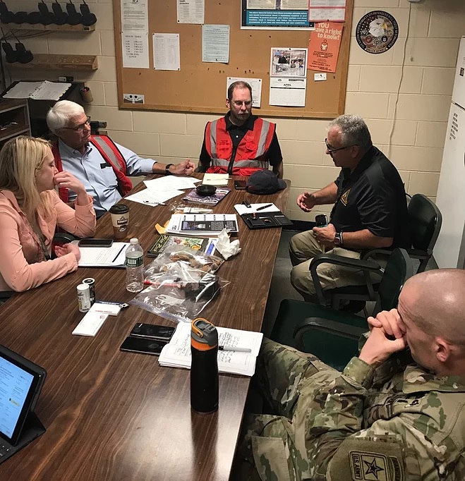 team members around a table during Gotham Shield 2017